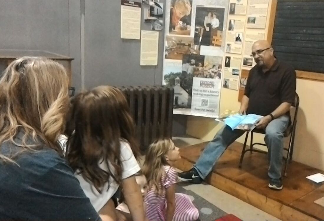 Wayne Harris-Wyrick, author of several books through 4RV Publishing, reading to children at the Edmond Author Festival